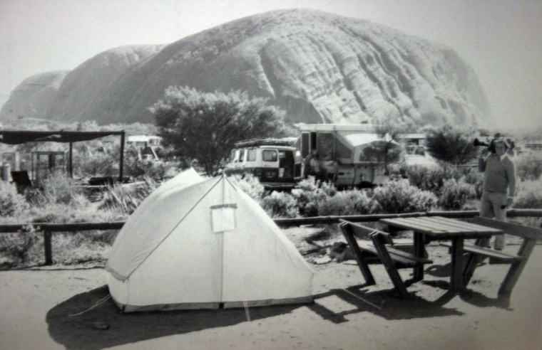 A handout photograph made available by the Australian news agency AAP showing the camping area, including Lindy Chamberlain's tent, where her daughter Azaria went missing, near the Uluru sandstone rock, Northern Territory, central Australia, Aug. 17, 1980.