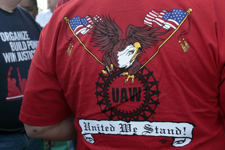 A United Auto Workers member wears a shirt proclaiming