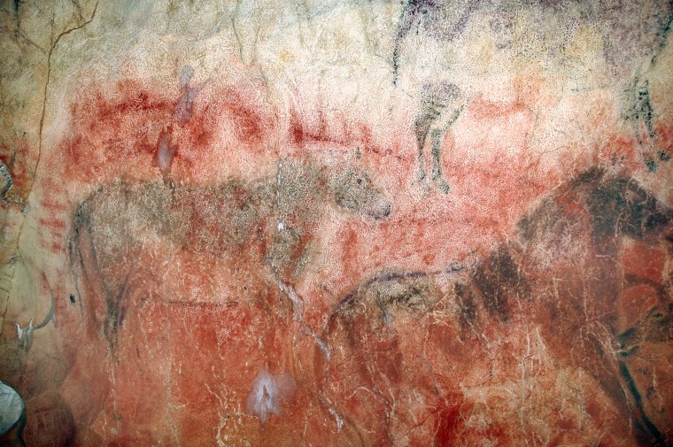 Six-foot (2-meter) paintings of horses in Spain's Tito Bustillo Cave overlay earlier red paintings that, from dating elsewhere in the cave, might be older than 29,000 years.