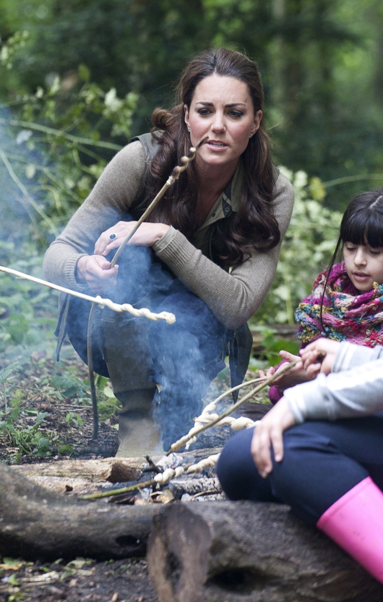 Taking the woods by storm, the duchess took part in a campfire with children at the Expanding Horizons Primary school camp.