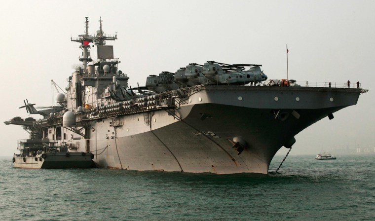 The USS Essex, a U.S. Navy amphibious assault ship, arrives in Hong Kong harbor for a scheduled port visit. The Essex had been positioned in Asia for 12 years and was returning to port in San Diego when it collided with a refueling ship off the coast of southern California on May 16.