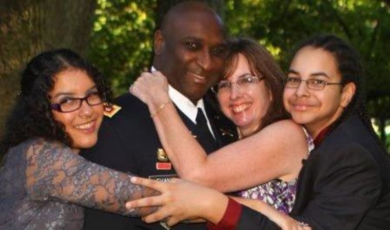 Adrae Evans with his daughter Ariel, wife Kristin, and son Gabe, before his 4th deployment.