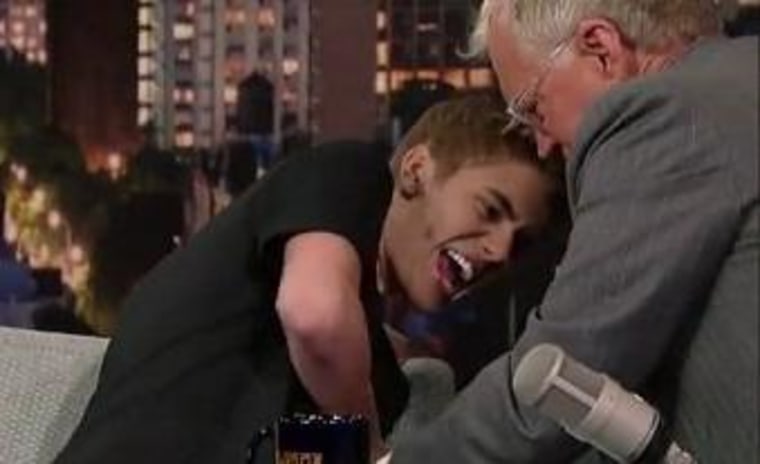 \"Late Show\" host David Letterman let Justin Bieber know just what he thought of his new tattoo on Thursday night's show.