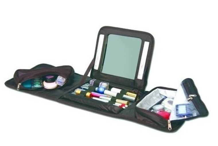 Koolatron's Travel Vanity unfolds into mini makeup station with pockets for all your products.