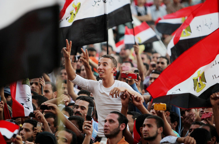 Supporters of Presidential candidate Mohamed Morsi demonstrate in Cairo, Egypt, on June 25, 2012.