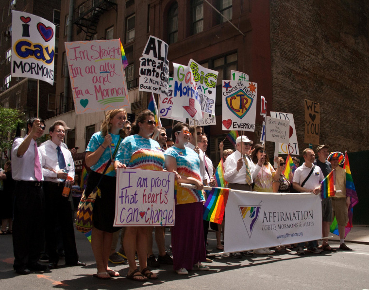 Mormons marching for LGBT rights and marriage equality posed for a photo before beginning the NYC Pride March on Sunday, June 24.