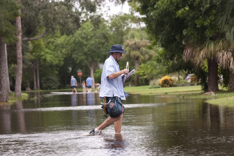 Riviera Bay Residents Return To Daily Life Amidst Flooding From ...