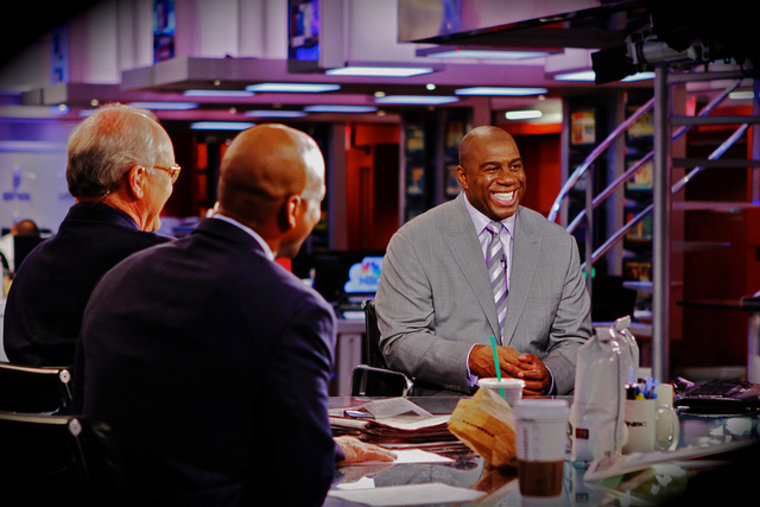 NBA Hall of Famer Magic Johnson talks with Mike Barnicle and Wes Moore on the set of Morning Joe