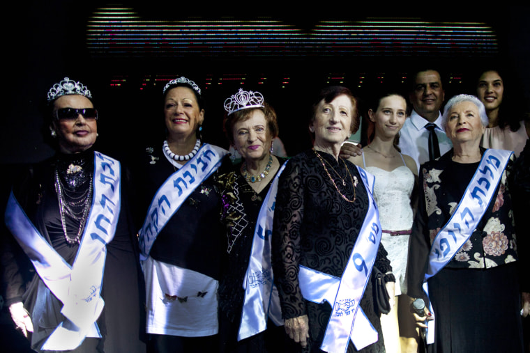 Contestants stand during a beauty pageant for Holocaust survivors in the northern Israeli city of Haifa on June 28, 2012.