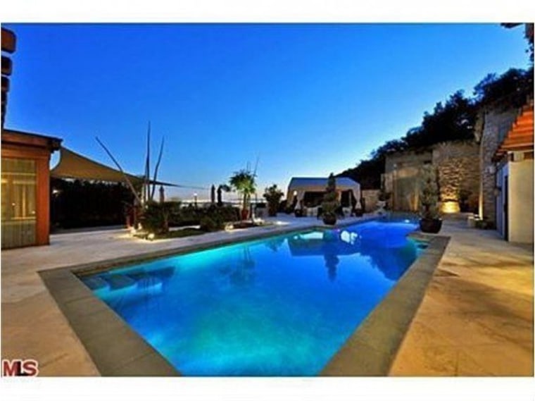 The pool area has views of the Los Angeles skyline.
