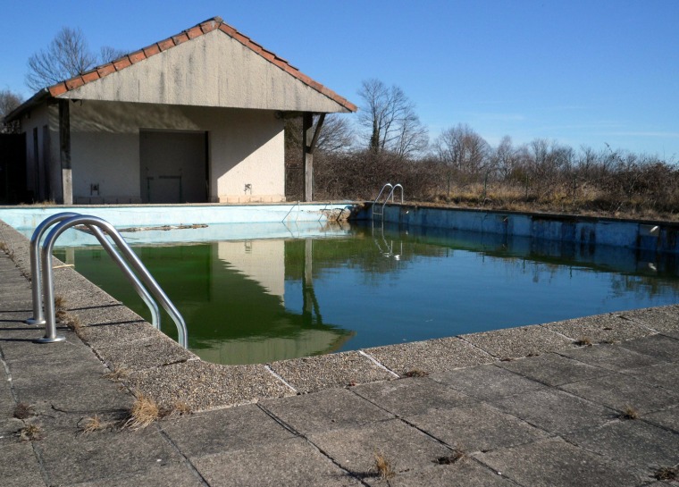 In this photo taken Tuesday Feb. 28, 2012, the swimming pool in the French village of Saint Nicolas Courbefy, in Limousin, a region in central France is seen. The entire hamlet is for sale and carried an asking price of just euro 300,000 ($440,000), the cost of a studio apartment in Paris. (AP Photo/Sarah DiLorenzo)