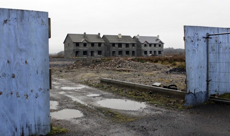 ATTENTION EDITORS - IMAGE 17 OF 20 FOR PACKAGE 'IRELAND'S GHOST HOUSING' The Waterways, an empty and unsold housing development, is pictured in the village of Keshcarrigan, County Leitrim January 28, 2012. During the economic boom, Irish developers attempted to cash in, building tens of thousands of houses. However, poor planning decisions and the global recession have resulted in a large number of estates being abandoned, unoccupied or unfinished. Picture taken January 28, 2012. REUTERS/Cathal McNaughton (IRELAND - Tags: BUSINESS CONSTRUCTION SOCIETY REAL ESTATE TPX IMAGES OF THE DAY)