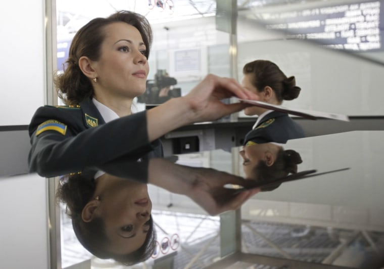 Ukrainian border guard working at the Borispol airport near Kiev.