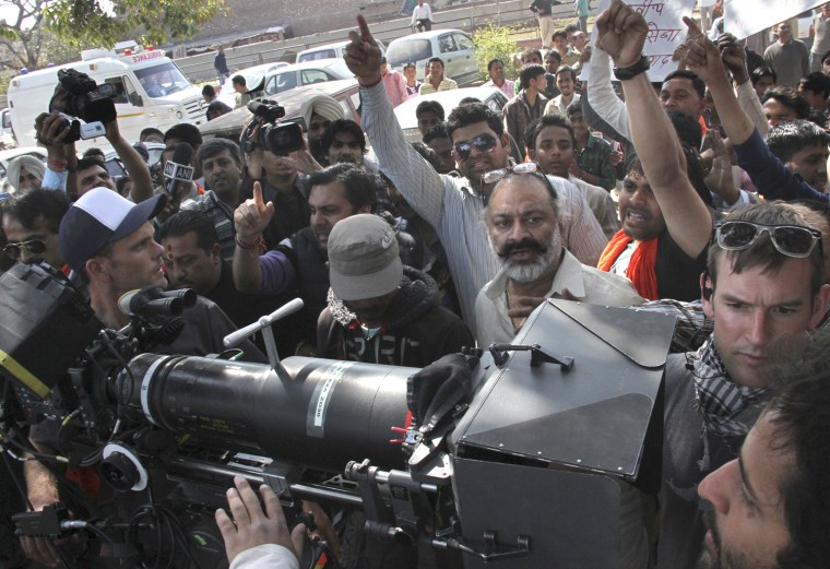 Activists of radical Vishva Hindu Parishad (VHP) Hindu group shout slogans during a protest at the shooting site of the movie