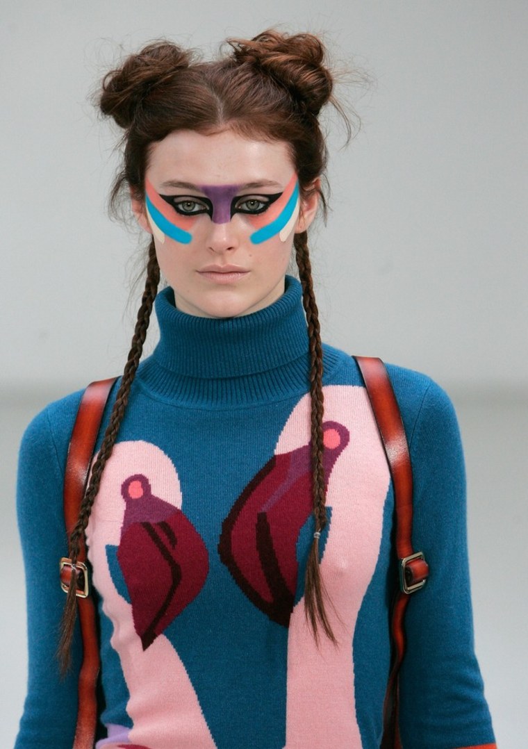 PARIS, FRANCE - MARCH 01: A model walks the runway during the Yang Du Ready-To-Wear Fall/Winter 2012 show as part of Paris Fashion Week at Espace Commines on March 1, 2012 in Paris, France. (Photo by Franck Prevel/Getty Images)