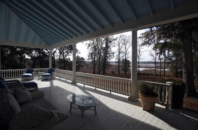 The view from a porch overlooks the former rice fields at the main house at Silver Hill Plantation, in Georgetown, South Carolina, February 17, 2012. The house that was restored in 1999 by the current owners of the property. Silver Hill is listed for sale with Friendfield Plantation that includes 3264 acres of land along the marsh outside in Georgetown, S.C. In the South Carolina Lowcountry, more than a half-dozen antebellum plantations, which don't change hands often, are for sale. Picture taken February 17, 2012. REUTERS/Randall Hill (UNITED STATES - Tags: REAL ESTATE BUSINESS SOCIETY TRAVEL)