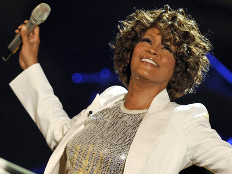 US singer Whitney Houston performs on stage during the 183rd edition of the TV show presented by  \"Wetten, dass..?\" (Let's Make a Bet) on October 3, 2009 in Freiburg, southern Germany.          AFP PHOTO   DDP/ JOERG KOCH          GERMANY OUT (Photo credit should read JOERG KOCH/AFP/Getty Images)