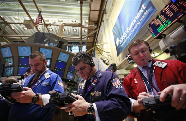 Traders work on the floor of the New York Stock Exchange, February 28, 2012. REUTERS/Brendan McDermid