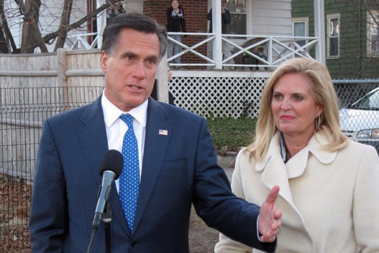Mitt and Ann Romney talking to the press after casting votes on Super Tuesday in Belmont, Massachusetts.