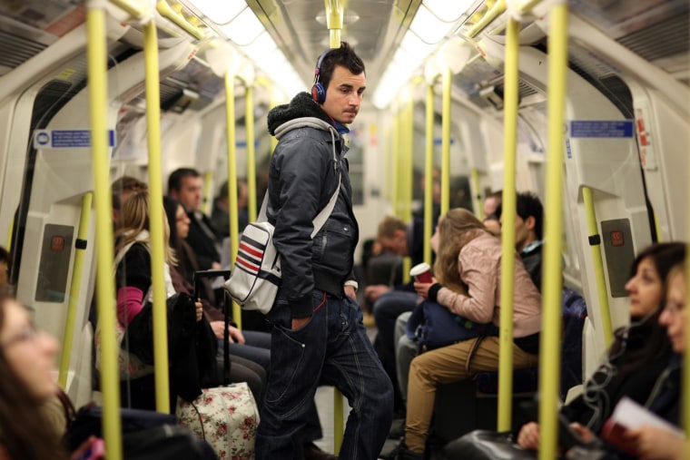 LONDON, ENGLAND - MARCH 05: Commuters travel in a carriage on a London Underground train on March 5, 2012 in London, England. London's underground rail system, commonly called the tube, is the oldest of its kind in the world dating back to 1890. It carries approximately a quarter of a million people around its network every day along its 249 miles of track and 270 stations. The network has undergone several years of upgrade work and refurbishment in preparation for the Olympic Games which take place this summer. During this time the tube is expected to carry millions of visitors to and from the Olympic Parks. (Photo by Dan Kitwood/Getty Images)