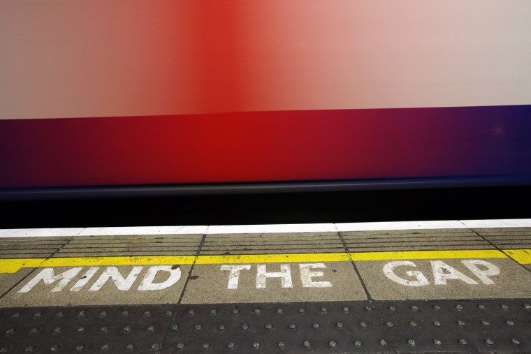 LONDON, ENGLAND - FEBRUARY 28: A train moves along a platform at an Underground station on February 28, 2012 in London, England. London's underground rail system, commonly called the tube, is the oldest of its kind in the world dating back to 1890. It carries approximately a quarter of a million people around its network every day along its 249 miles of track and 270 stations. The network has undergone several years of upgrade work and refurbishment in preparation for the Olympic Games which take place this summer. During this time the tube is expected to carry millions of visitors to and from the Olympic Parks. (Photo by Dan Kitwood/Getty Images)