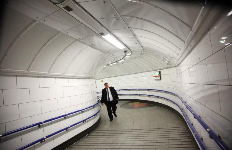 LONDON, ENGLAND - FEBRUARY 14: Commuters make their way through an underground tube station on February 14, 2012 in London, England. The escalators at Angel tube station are the longest escalators on the tube network. London's underground rail system, commonly called the tube, is the oldest of its kind in the world dating back to 1890. It carries approximately a quarter of a million people around its network every day along its 249 miles of track and 270 stations. The network has undergone several years of upgrade work and refurbishment in preparation for the Olympic Games which take place this summer. During this time the tube is expected to carry millions of visitors to and from the Olympic Parks. (Photo by Dan Kitwood/Getty Images)