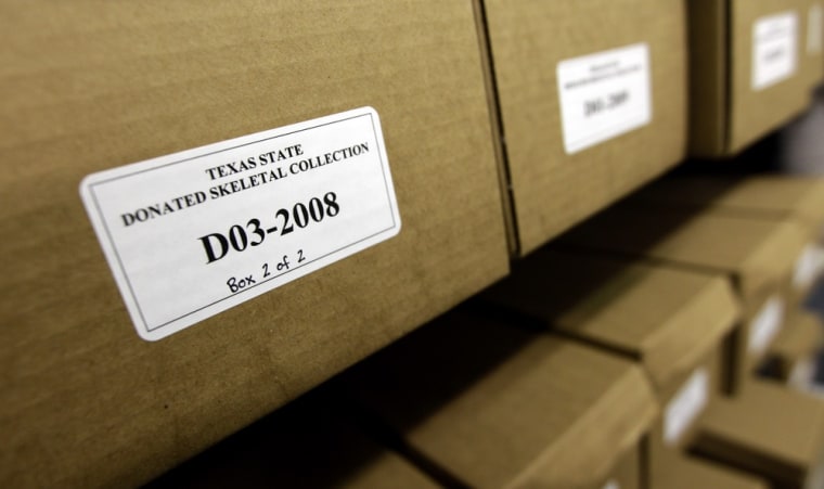 Boxes of skeletal remains sit on the shelves at Texas State University's Forensic Anthropology Research Facility Thursday, Feb. 9, 2012, in San Marcos, Texas. What they're finding at the research facility debunks some of what they and other experts believed about estimating time of death for a person whose remains are found outdoors and exposed to the environment. (AP Photo/David J. Phillip)