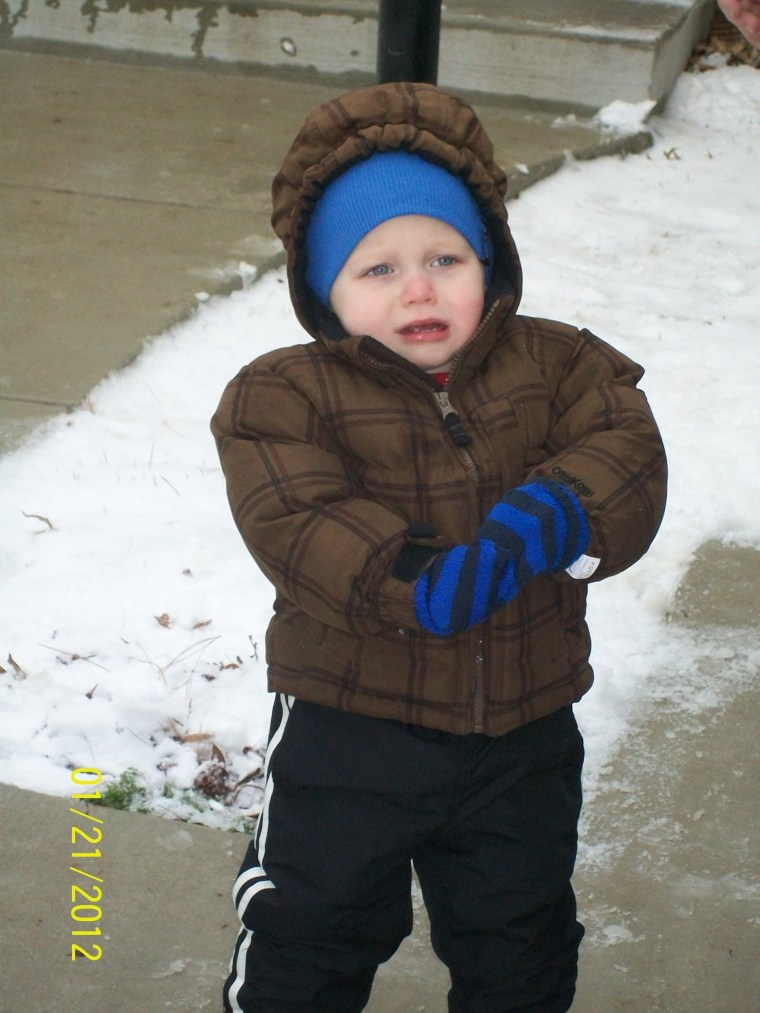 Nicolas, 17 months, says get these mittens off me!