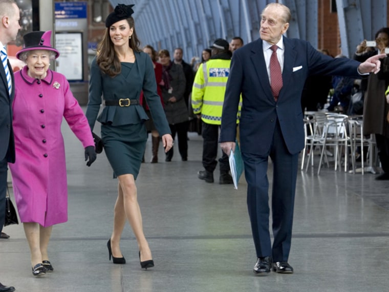 Britain's Queen Elizabeth, Catherine, Duchess of Cambridge (2nd R) and Prince Philip (R) arrive to board a train to visit Leicester, at Kings Cross Station in London March 8, 2012. Flag-waving crowds of Britons lined the streets and politicians proffered gushing praise as Queen Elizabeth launched a nationwide tour of her realm on Thursday to celebrate her Diamond Jubilee. REUTERS/Anthony Devlin/Pool (BRITAIN - Tags: ROYALS ENTERTAINMENT SOCIETY)