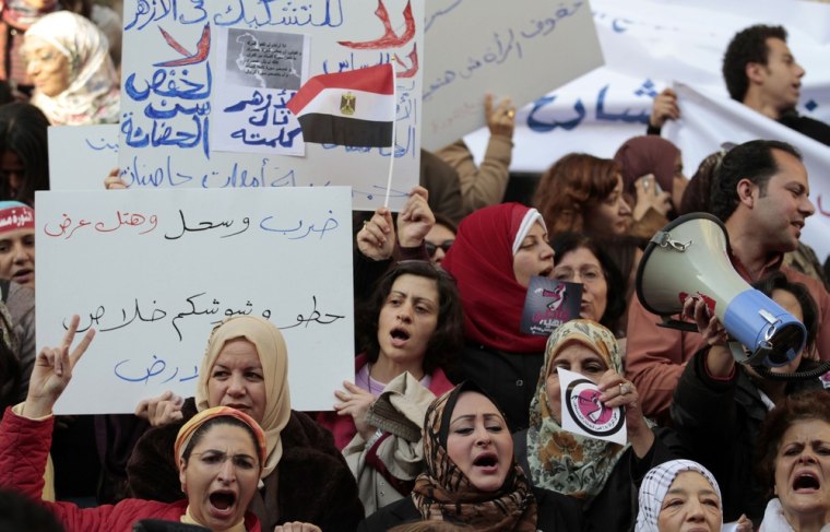 Women shout slogans against the Egyptian military council before marching with other women to mark International Women's Day in Cairo March 8, 2012. REUTERS/Mohamed Abd El Ghany (EGYPT - Tags: CIVIL UNREST POLITICS)