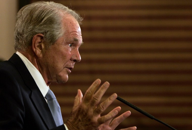 **FILE** Pat Robertson gestures during a press conference in Jerusalem in this August file photo. A Texas bodybuilder suing Robertson contends the religious broadcaster walked into federal court for a legal proceeding and told him: