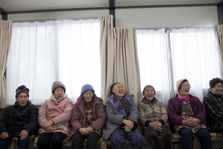 MINAMISANRIKU, JAPAN - MARCH 05: Elderly Japanese, whose homes were destroyed in last year's tsunami and now living in temporary housing, mingle at a community centre in a temporary housing site on March 05, 2012 in Minamisanriku, Japan. As the one year anniversary approaches, the areas most affected by an earthquake and subsequent tsunami that left 15,848 dead and 3,305 missing according to Japan's National Police Agency continue to struggle. Thousands of people still remain without homes living in temporary dwellings. The Japanese government faces an uphill battle with the need to dispose of rubble as it works to rebuild economies and livelihoods. (Photo by Daniel Berehulak /Getty Images)