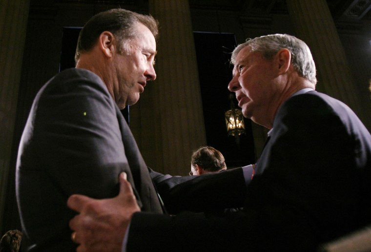 WASHINGTON - DECEMBER 17: 9-11 Commission Chairman Thomas Kean greets Sen. Bob Graham (D-FL) after U.S. President George W. Bush signed the intelligence reform bill at the Andrew W. Mellon Auditorium December 17, 2004 in Washington, DC. The bill, which faced adversity during congressional passage, is the largest overhaul of U.S. intelligence gathering in 50 years. (Photo by Shaun Heasley/Getty Images)