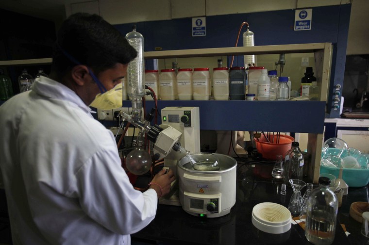 An Indian scientist works inside a laboratory of the Research and Development Centre of Natco Pharma Ltd. in Hyderabad, India, Wednesday, March 13, 2012. India effectively ended Bayer's monopoly on a patented cancer drug Monday, licensing a much cheaper generic under a unique law aimed at keeping costs affordable. In a decision likely to upset Western pharmaceuticals, the patent office approved Natco Pharma Ltd.'s application to produce the kidney and liver cancer treatment sorefinib. (AP Photo/Mahesh Kumar A.)