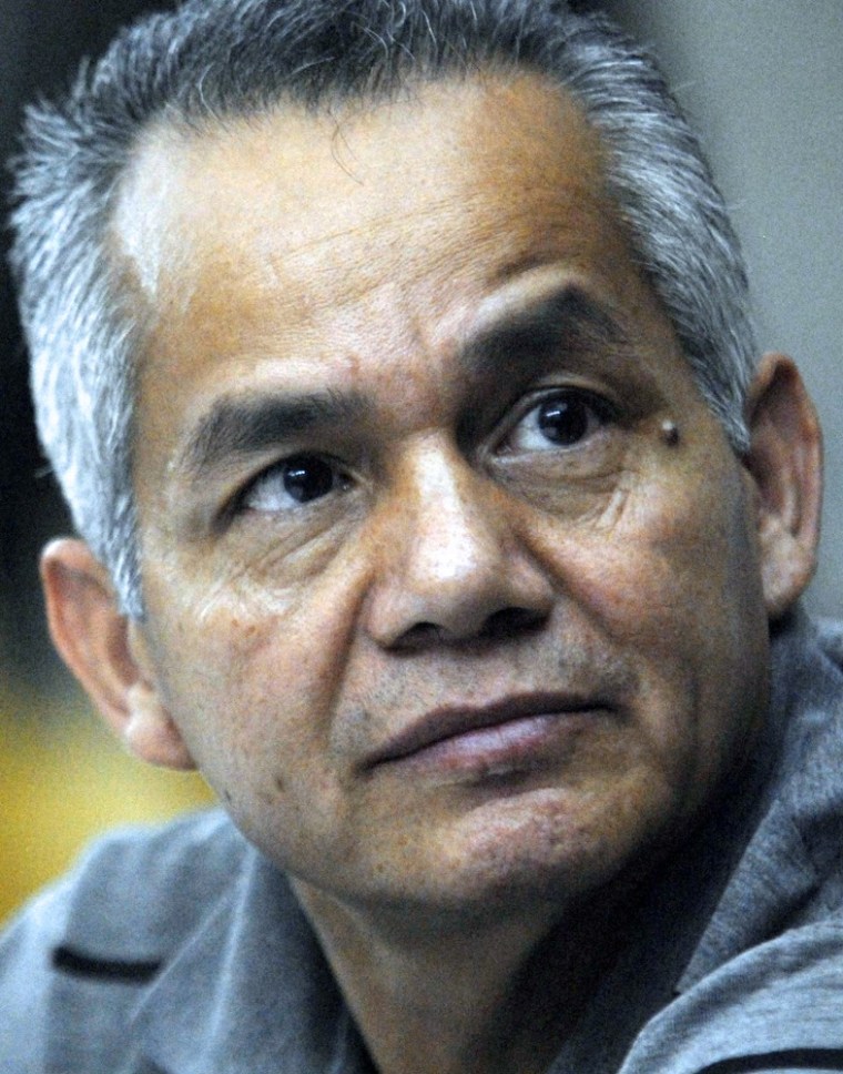 Former Army Special Forces member Pedro Pimentel Rios is seen at the Supreme Court of Justice in Guatemala City on March 12, 2012. A Guatemalan court sentenced Pimentel to 6,060 years in prison because of his participation in a 201 peasants massacre in 1982. AFP PHOTO / Jose Miguel LAM (Photo credit should read Jose Miguel Lam/AFP/Getty Images)