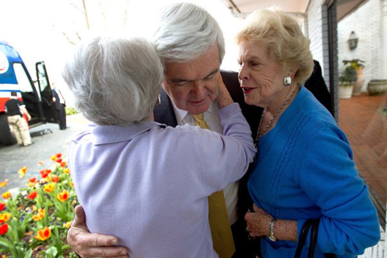 Newt Gingrich hugging supporters at the Vestavia Hills Country Club in Birmingham, Alabama on Tuesday.