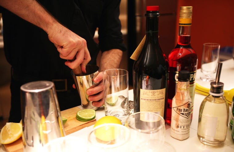 Bartender Nathan Paluck prepares a drink with pisco.