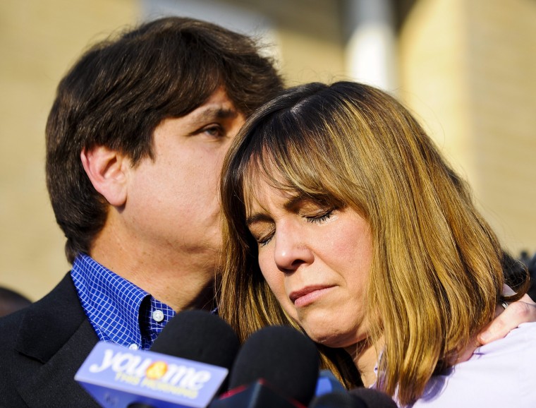 epa03145069 Former Illinois Governor Rod Blagojevich kisses hhis wife Patti as he speaks outside their home on the day before he is to report to prison on his corruption conviction in Chicago, Illinois, USA 14 March 2012. Blagojevich was convicted for attempting to sell the US Senate seat formerly held by President Barack Obama, among other charges.He is scheduled to report to the Federal corrections facility in Littleton, Colorado, USA to begin his 14 year sentence on 15 March. EPA/TANNEN MAURY