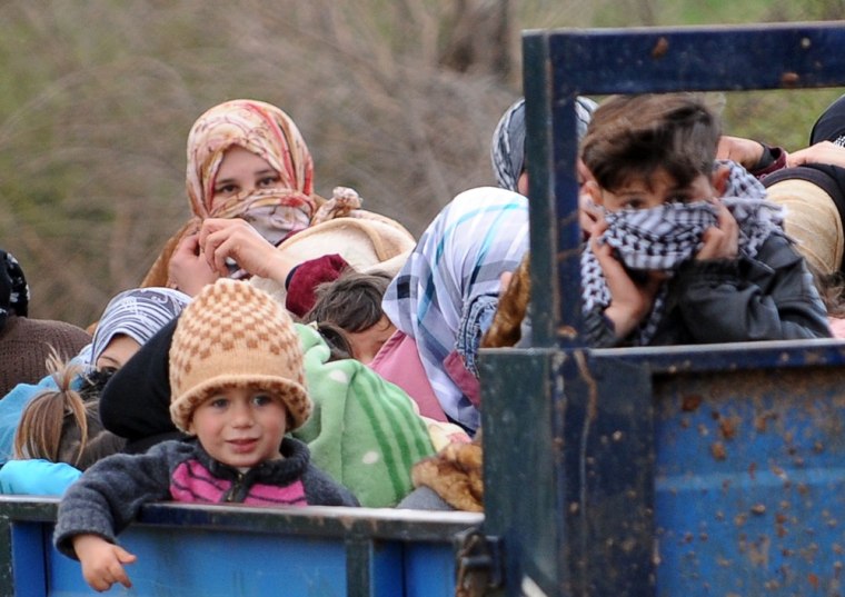 Syrian Refugees Flee Fighting In Idlib To Nearby Turkey