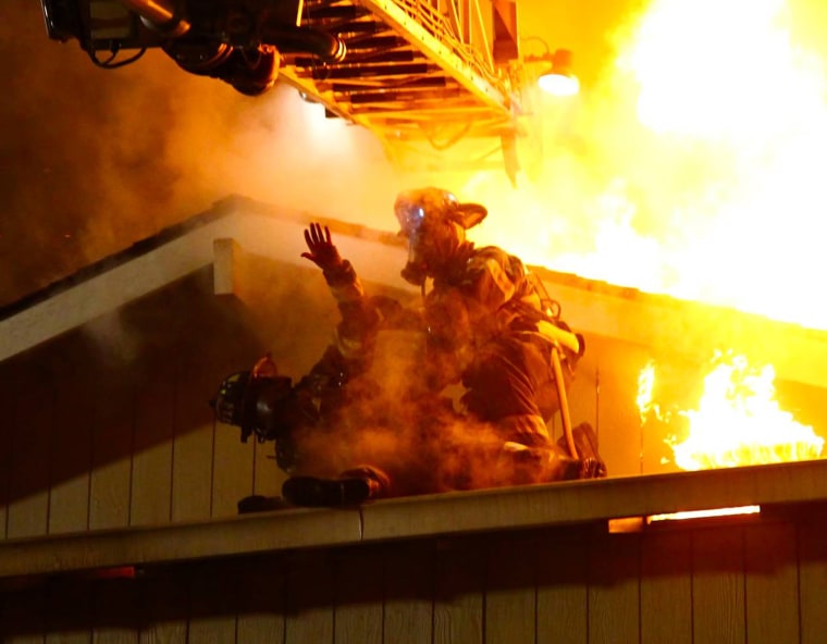 A firefighter was injured in a fourplex fire in West San Jose that displaced nearly 20 residents from their homes this morning, according to San Jose fire officials. A call came in about a fire in the 3700 block of Underwood Drive at 2:43 a.m., according to San Jose fire senior dispatcher Brenda Jaime. One firefighter was injured in the four-alarm blaze. San Jose fire Capt. Mary Gutierrez said the firefighter fell through the roof at 3:08 a.m. and was then hospitalized in stable condition. The firefighter has yet to be released from the hospital, she said. The fire started on the bottom floor and spread upward to the attic, Gutierrez said. All residents were evacuated and the American Red Cross is assisting the 17 displaced resident this morning, Gutierrez said. Gutierrez said a resident on the first floor said they had left a candle unattended, which the captain said is a probable cause of the blaze. The fire was knocked down at 3:38 a.m., however, some crews are still at the scene this morning, according to Gutierrez. Seventy firefighters, including mutual aid assistance from the Santa Clara County Fire Department, responded to the fire this morning, Gutierrez said.