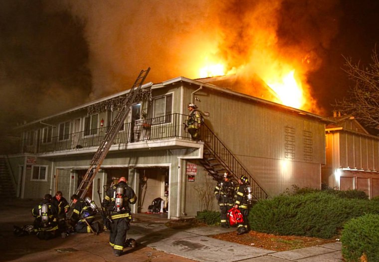 A firefighter was injured in a fourplex fire in West San Jose that displaced nearly 20 residents from their homes this morning, according to San Jose fire officials. A call came in about a fire in the 3700 block of Underwood Drive at 2:43 a.m., according to San Jose fire senior dispatcher Brenda Jaime. One firefighter was injured in the four-alarm blaze. San Jose fire Capt. Mary Gutierrez said the firefighter fell through the roof at 3:08 a.m. and was then hospitalized in stable condition. The firefighter has yet to be released from the hospital, she said. The fire started on the bottom floor and spread upward to the attic, Gutierrez said. All residents were evacuated and the American Red Cross is assisting the 17 displaced resident this morning, Gutierrez said. Gutierrez said a resident on the first floor said they had left a candle unattended, which the captain said is a probable cause of the blaze. The fire was knocked down at 3:38 a.m., however, some crews are still at the scene this morning, according to Gutierrez. Seventy firefighters, including mutual aid assistance from the Santa Clara County Fire Department, responded to the fire this morning, Gutierrez said.