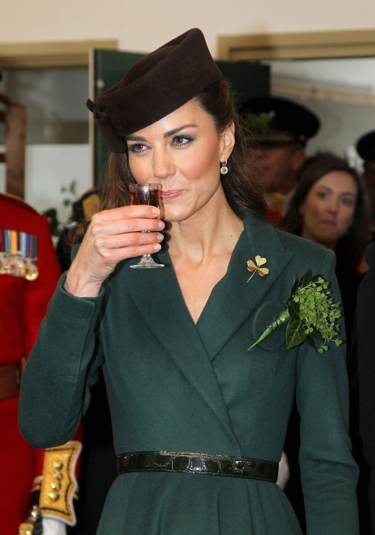 epa03148806 Catherine, Duchess of Cambridge holds a glass of Harvey's Bristol Creme in the Junior's Mess as she visits Aldershot Barracks on St Patrick's Day, in Aldershot, Britain, 17 March 2012. The Duchess presented shamrocks to the Irish Guards at a St Patrick's Day parade during her visit. EPA/CHRIS JACKSON / POOL UK AND IRELAND OUT EDITORIAL USE ONLY
