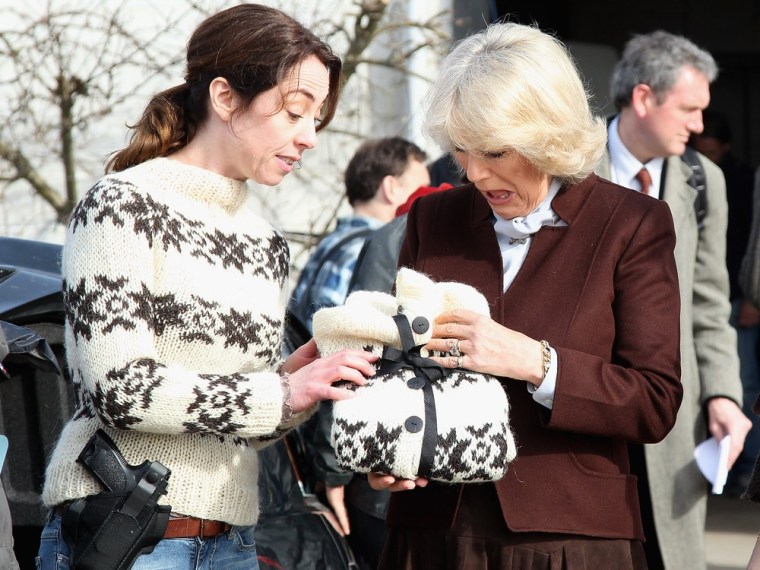 COPENHAGEN, DENMARK - MARCH 27: Actress Sofie Grabol presents Camilla, Duchess of Cornwall with gifts during a visit to the set of Danish TV Series 'The Killing' on March 27, 2012 in Copenhagen, Denmark. Camilla, Duchess of Cornwall and Prince Charles are on the last day of a Diamond Jubilee Tour that has taken in Norway, Sweden and Denmark. (Photo by Chris Jackson/Getty Images)