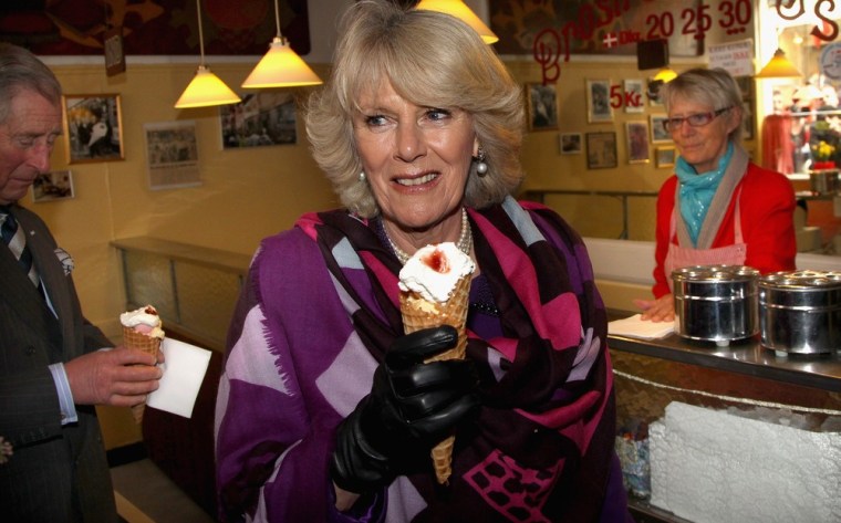 ELSINORE, DENMARK - MARCH 26: Camilla, Duchess of Cornwall and Prince Charles, Prince of Wales enjoy an icecream from, Brostræde Fløde-IS, the oldest icecream shop in Denmark during a tour of the old town on March 26, 2012 in Elsinore, Denmark. Prince Charles, Prince of Wales and Camilla, Duchess of Cornwall are on a Diamond Jubilee tour of Scandinavia that takes in Norway, Sweden and Denmark. (Photo by Chris Jackson - Pool/Getty Images)