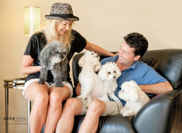 Fiona is pictured here with her new family, Michele and Chris Gentry of Southern California and their other dogs.