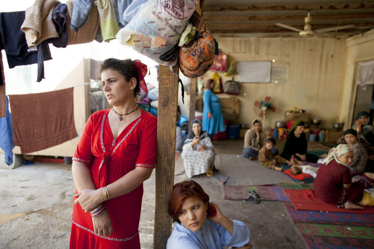 MAZAR-E-SHARIF, AFGHANISTAN - OCTOBER 22: Afghan female prisoners hang out inside the courtyeard of the women's prison October 22, 2010 in Mazar-e-Sharif, Afghanistan. According to Afghanistan's Ministry for Women and the Independent Human Rights Commission, many of the females that are incarcerated are being detained for