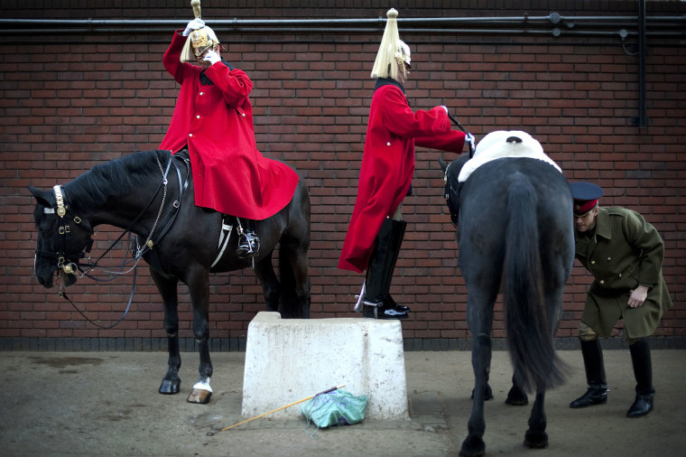 Members of the Lifeguards Household Cavalry prepare for the Major General's inspection and the state celebrations for Britain's Queen Elizabeth II's diamond jubilee.