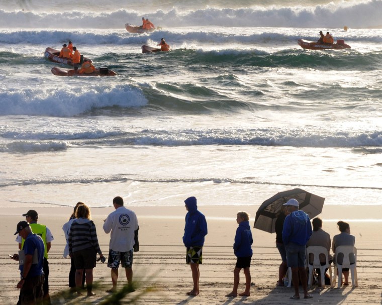 Surf Rescue teams search for missing 14 year old Matt Barclay at Kurrawa beach.