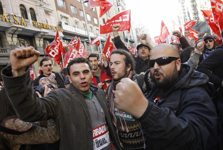 Protesters shout slogans during a general strike in central Madrid March 29, 2012. Spanish unions said a high turnout for a general strike to protest government budget cuts and reforms on Thursday had almost brought heavy industry to a halt while the government said the day was proceeding normally.