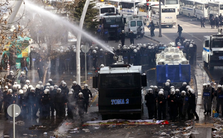 Police use water cannon to disperse demonstrators during a protest against a government attempt to railroad a new education bill through parliament in Ankara, Turkey, on March 29.
